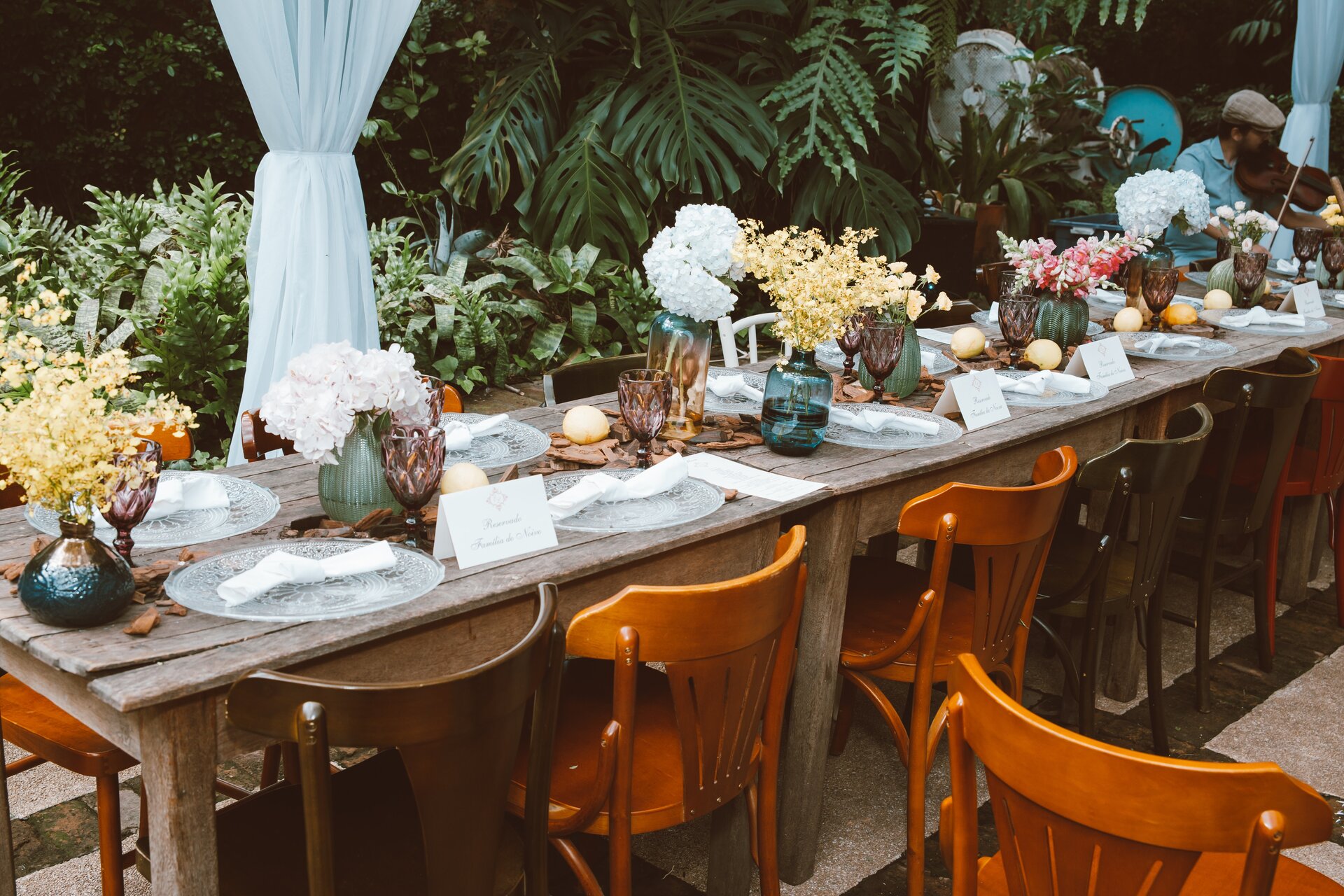 Wedding Table set with green plants in back