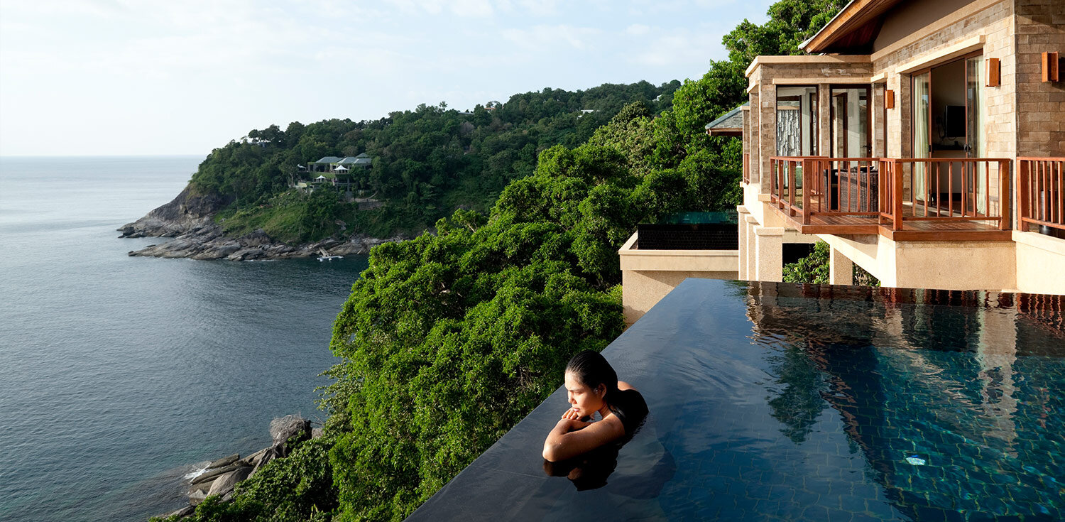 Woman in pool overlooking the landscape